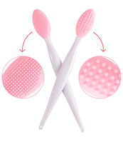 Load image into Gallery viewer, Double-sided pink silicone lip brush featuring a soft exfoliating surface on one side and a gentle massaging texture on the other. Designed for smooth, effective lip care.

